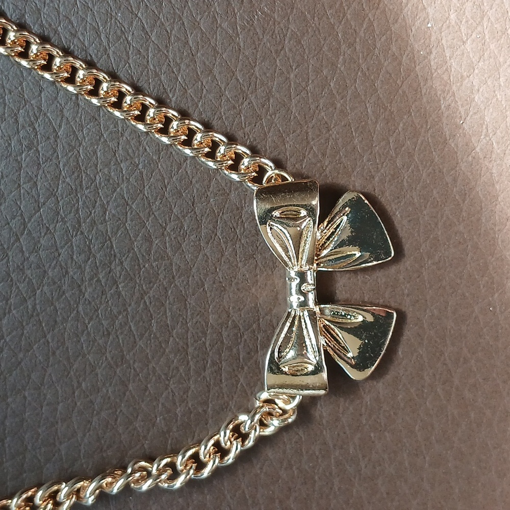 Elegant Gold Bow Necklace - Picture 4 of 7